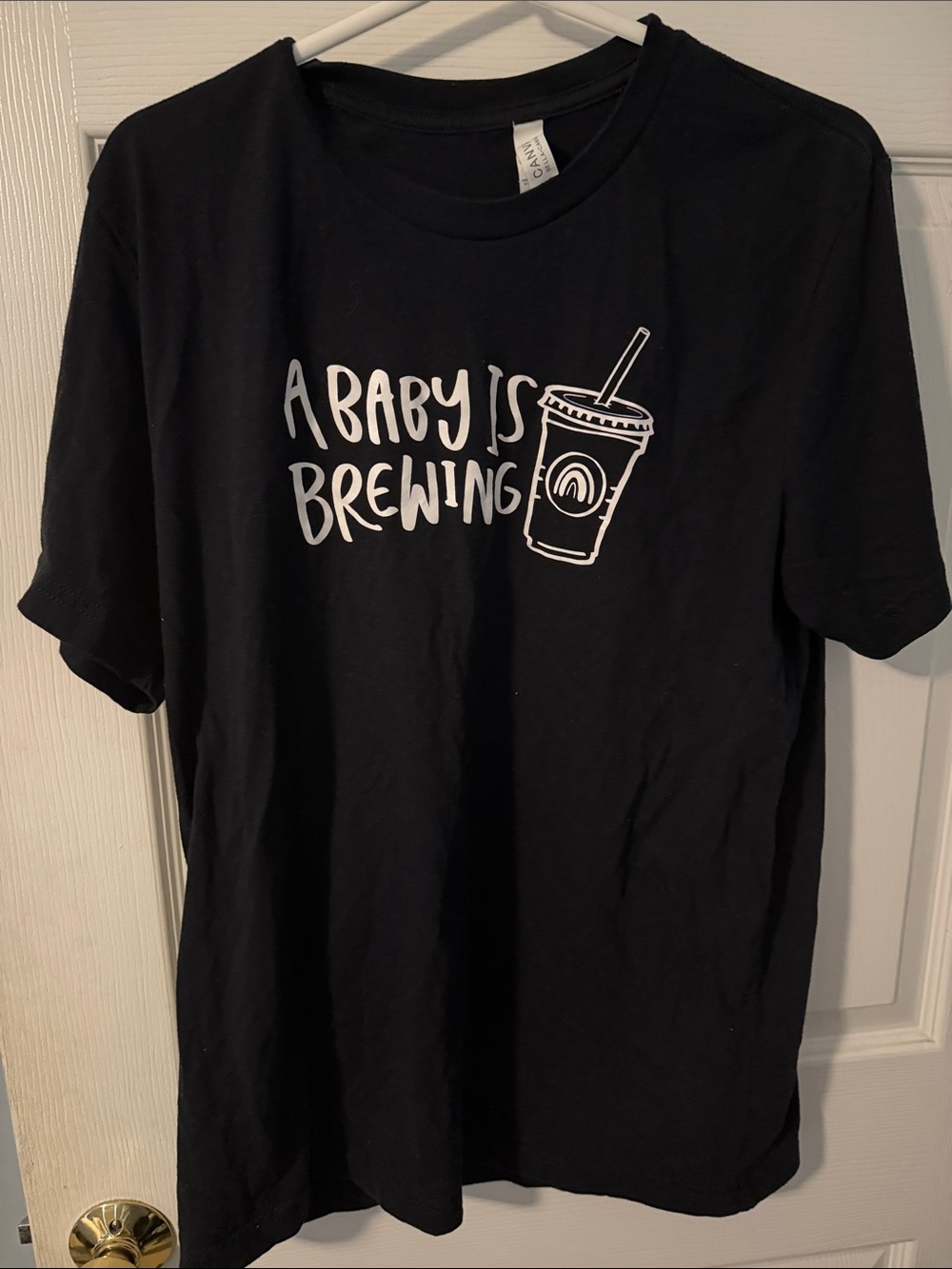 Bella Canvas Black Tee with White "A Baby Is Brewing" Graphic